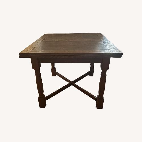 Used Solid Wood Antique Dining Table with Leaves for sale on AptDeco