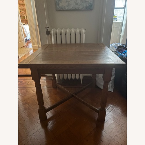 Used Solid Wood Antique Dining Table with Leaves  for sale on AptDeco