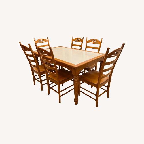 Used Light Brown Wood Dining Table for sale on AptDeco