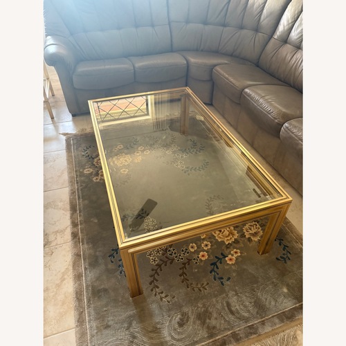 Used Vintage/Antique Gold Glass Coffee Table for sale on AptDeco