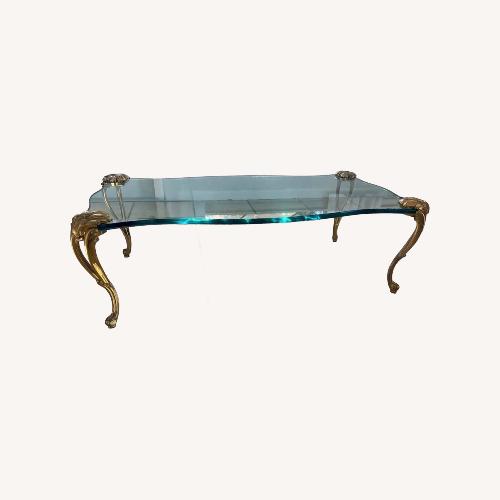 Used Floating GlassTable with Brass Legs for sale on AptDeco