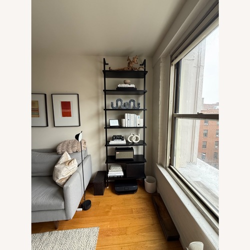 Used CB2 Stairway 96" Black Metal Wall Mount Bookcase for sale on AptDeco