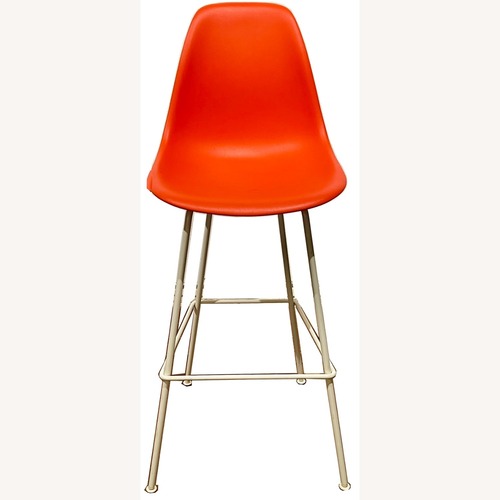Used Herman Miller Eames Barstools Orange Stools for sale on AptDeco