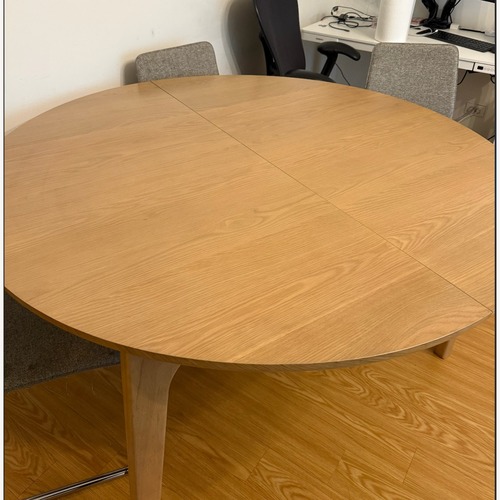 Used Article Plumas Natural Dining Table for sale on AptDeco