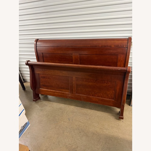 Used Sligh Furniture Dark Brown Wood Queen Bed for sale on AptDeco