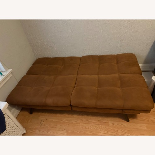 Used Pottery Barn Dark Brown Suede Futon for sale on AptDeco