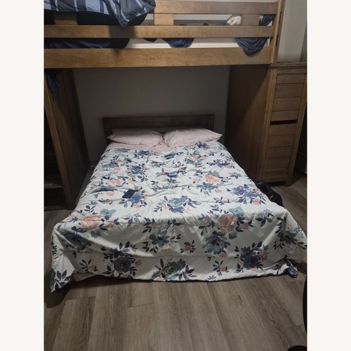 Used Rooms To Go Light Brown Wood Bunk Bed for sale on AptDeco