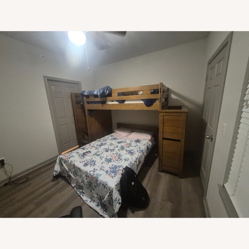 Used Rooms To Go Light Brown Wood Bunk Bed for sale on AptDeco