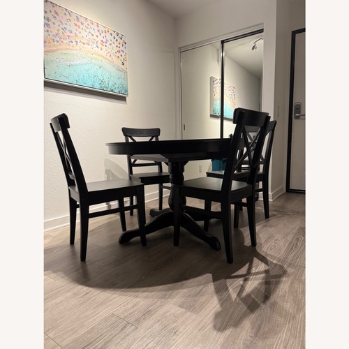 Used IKEA Rosentorp Black Wood Dining Set for sale on AptDeco