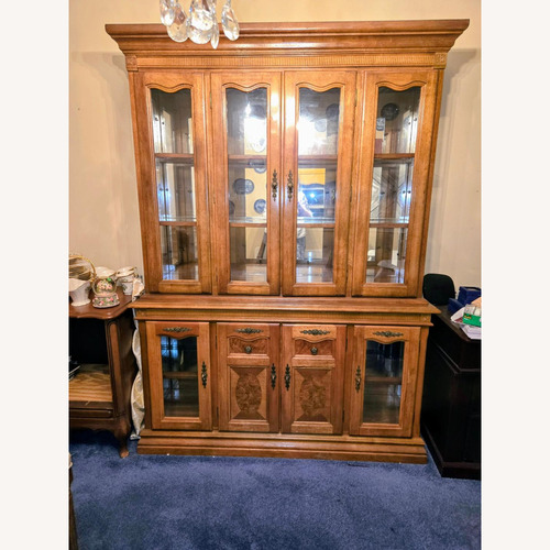 Used Brown Wood & Glass China Cabinet for sale on AptDeco