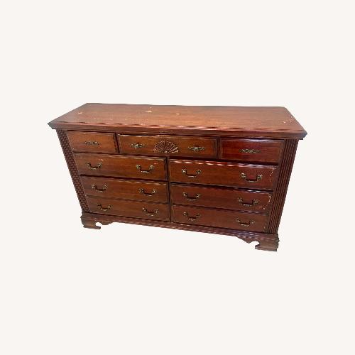 Used Dark Brown Wood Dresser for sale on AptDeco