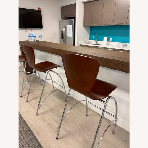 Used Light Brown Wood Dining Chairs for sale on AptDeco