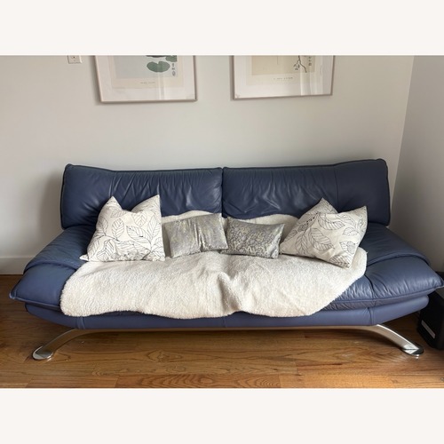 Used Vintage/Antique Nicoletti Blue Leather Loveseat for sale on AptDeco