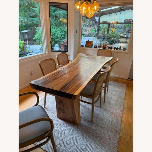 Used HD Buttercup Wood Dining Table for sale on AptDeco