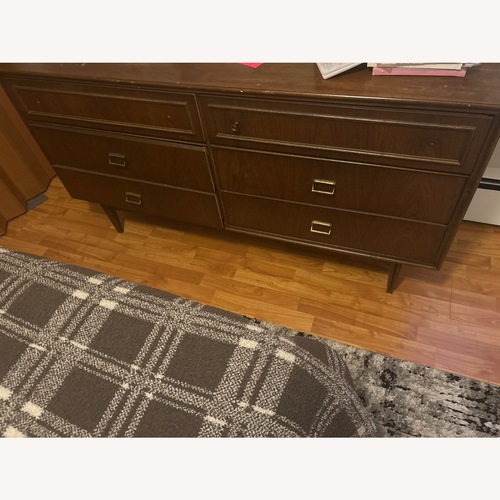Used Vintage/Antique Dark Brown Wood Dresser for sale on AptDeco