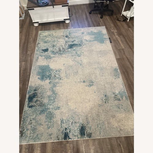 Used Johnathan Y Area Rug 5' x 8' for sale on AptDeco