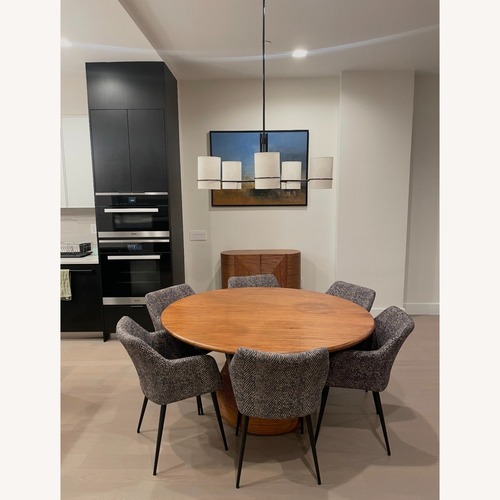 Used CB2 Salamina Rattan Light Brown Wood Dining Table for sale on AptDeco