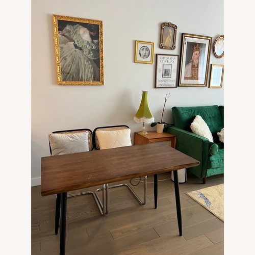 Used Antique Dark Brown Wood Dining Table for sale on AptDeco
