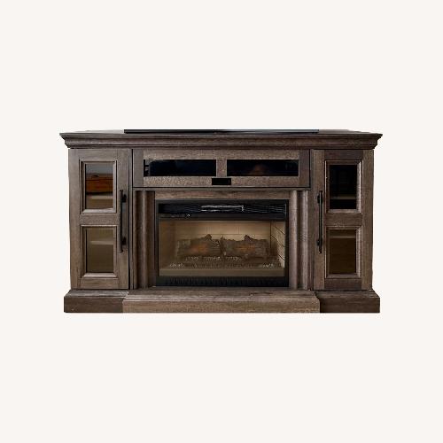 Used Grey Fireplace/Heater Storage TV Stand for sale on AptDeco