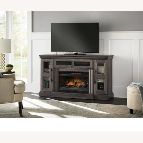 Used Grey Fireplace/Heater Storage TV Stand for sale on AptDeco