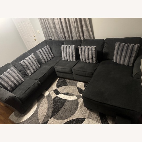 Used Ashley Furniture Dark Gray 3+ Piece Sectional for sale on AptDeco