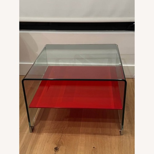 Used Postmod Waterfall Glass Coffee Table W Red Shelf for sale on AptDeco
