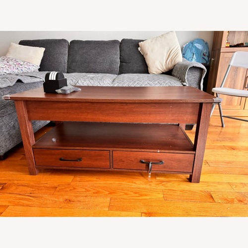 Used Rolanstar Lift Top Coffee Table with Drawers for sale on AptDeco