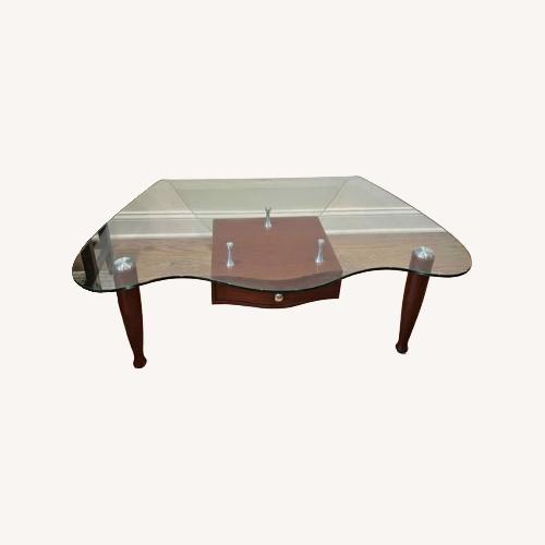 Used Vintage/Antique Light Brown Glass Coffee Table for sale on AptDeco