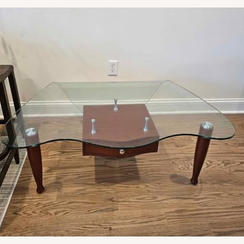 Used Vintage/Antique Light Brown Glass Coffee Table for sale on AptDeco