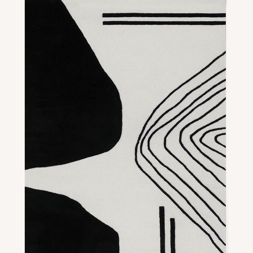 Used Handmade Wool Ivory/Black Rug for sale on AptDeco