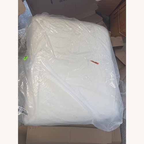 Used Crate & Barrel White Ottoman for sale on AptDeco