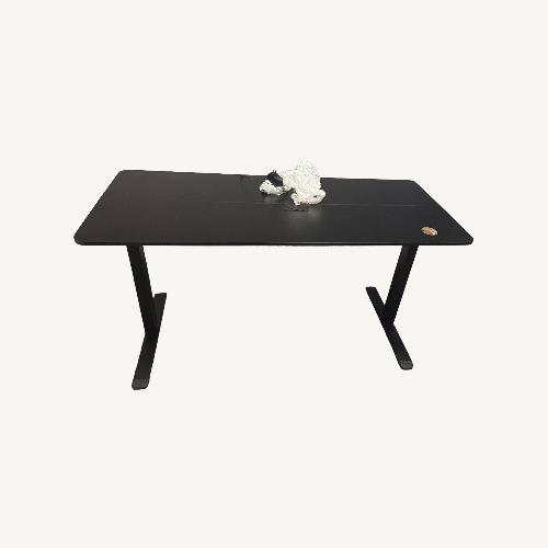 Used Height Adjusting Table for sale on AptDeco