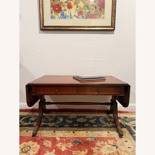Used Mahogany and Leather Drop-Leaf Coffee Table for sale on AptDeco