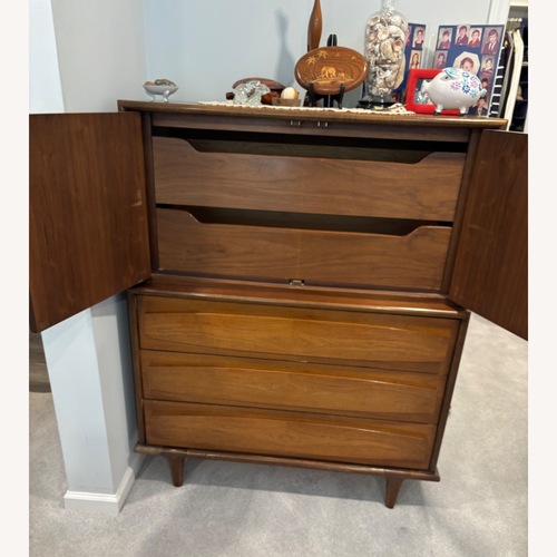 Used Vintage/Antique Dark Brown Wood Armoire for sale on AptDeco