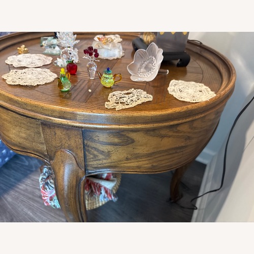 Used Vintage/Antique Dark Brown Wood Side Table for sale on AptDeco