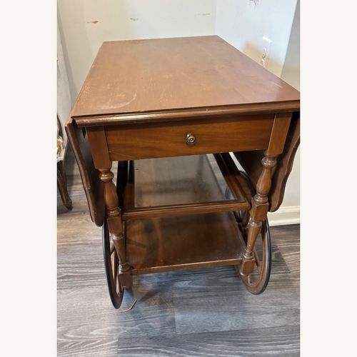 Used Vintage/Antique Dark Brown Side Table for sale on AptDeco