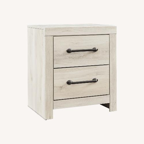 Used Ashley Furniture Cambrick White Wood Nightstand for sale on AptDeco