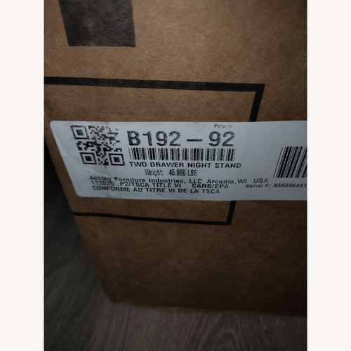 Used Ashley Furniture White Wood Wall Mirror for sale on AptDeco