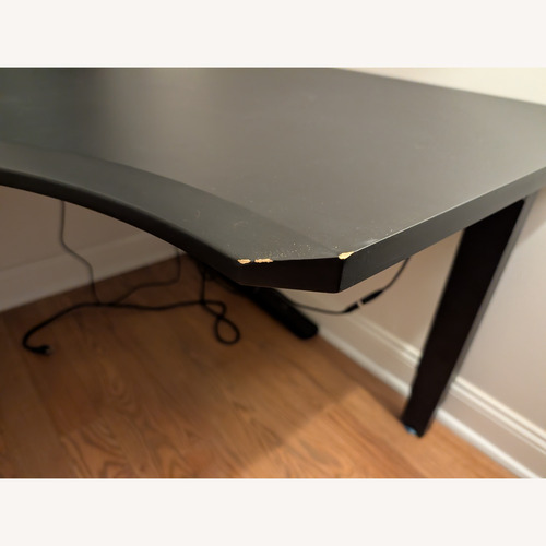 Used Black L-Shaped Standing Desk for sale on AptDeco
