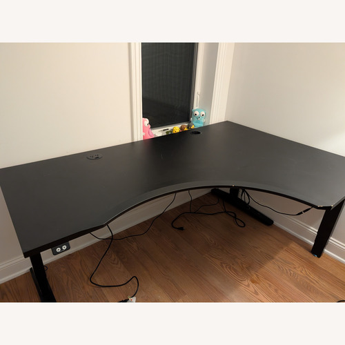 Used Black L-Shaped Standing Desk for sale on AptDeco