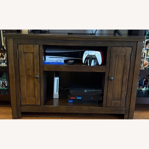 Used Ashley Entertainment Stand for 42" TV for sale on AptDeco
