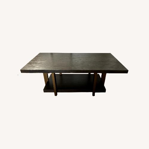 Used Dark Brown Wood Coffee Table for sale on AptDeco