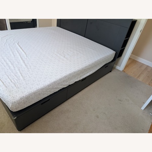 Used IKEA Nordli Bed Black Wood King Bed for sale on AptDeco