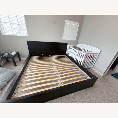 Used IKEA Dark Brown Wood King Bed for sale on AptDeco