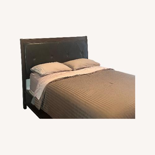 Used Dark Brown Wood Queen Bed for sale on AptDeco