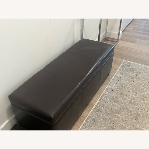 Used Dark Brown Faux Leather Ottoman for sale on AptDeco