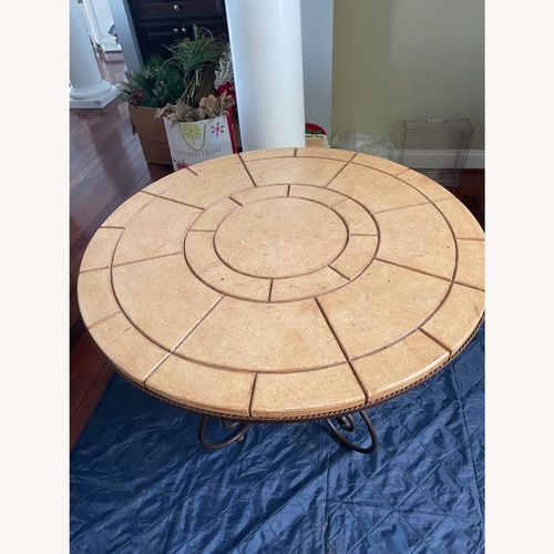 Used Arhaus Rustic Iron With Stone Top Stone Dining Table for sale on AptDeco