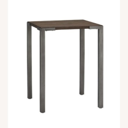 Used CB2 Dark Brown Wood Dining Table for sale on AptDeco