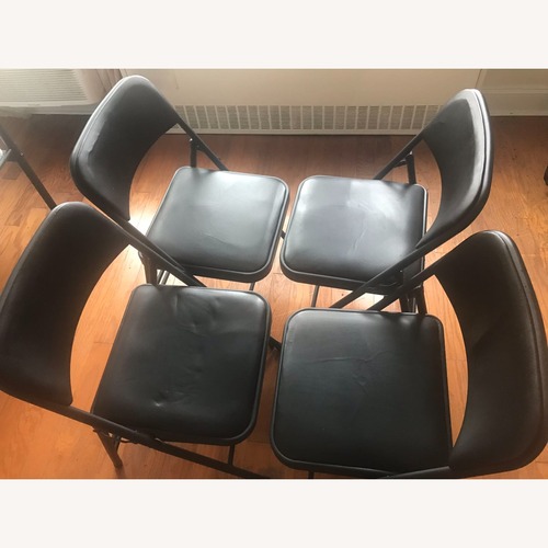 Used Steel Frame Metal Foam Padded Folding Chairs for sale on AptDeco