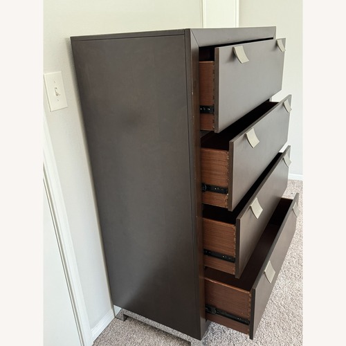 Used Raymour & Flanigan Dark Brown Wood Dresser for sale on AptDeco